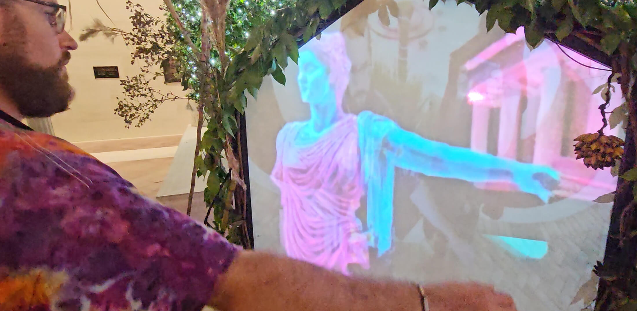 Guests at the appleton museum in ocala florida interacting with an interactive projection mapped art installation by Drake Arnold